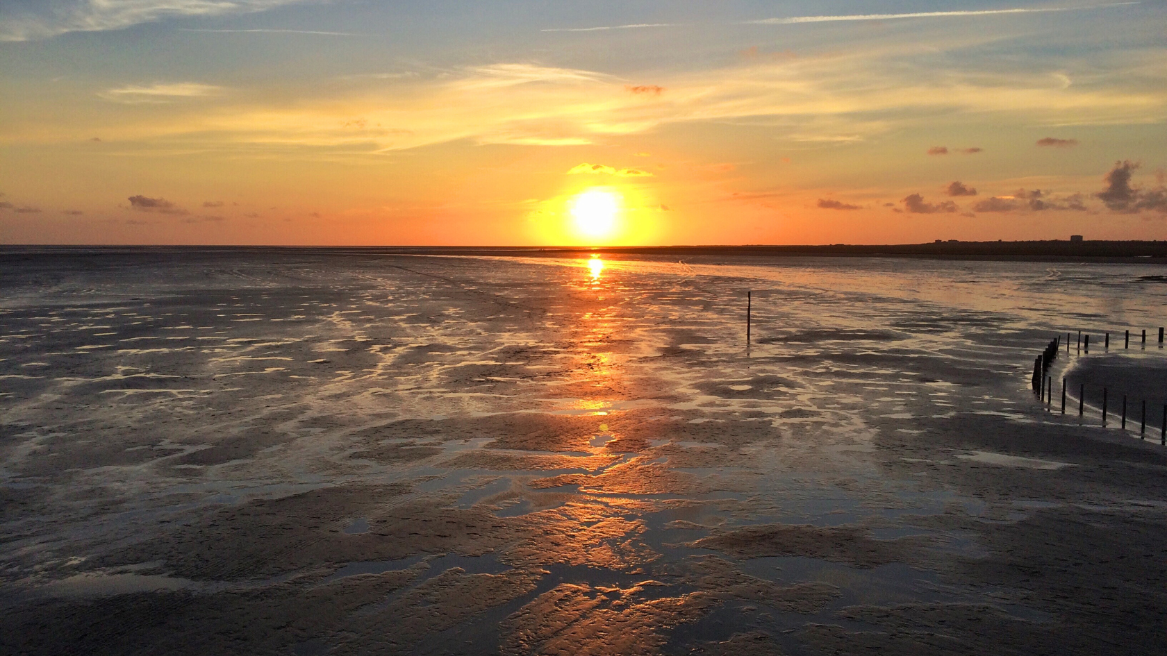 Sonnenuntergang über dem Wattenmeer